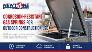 Corrosion-resistant gas springs for outdoor construction use supporting an open truck toolbox lid.